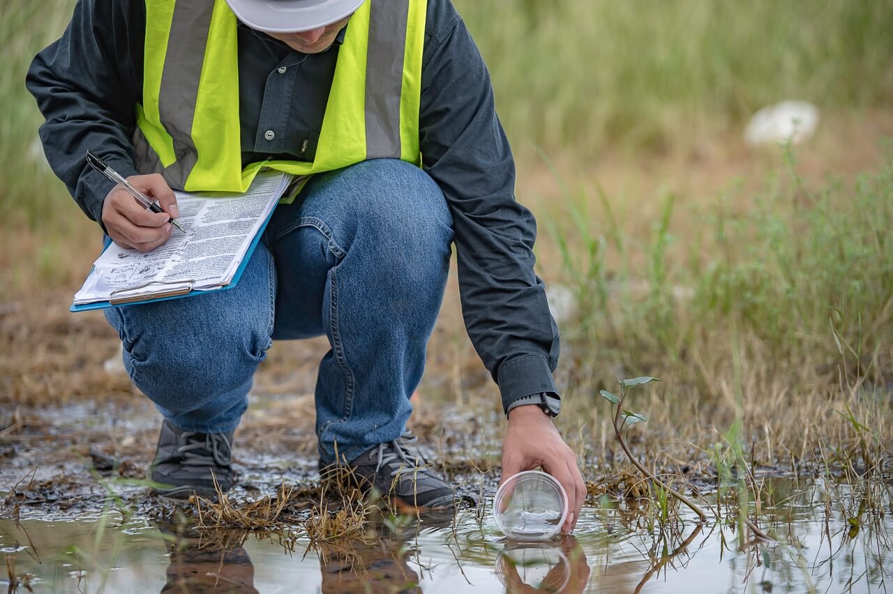 Scientist taking a water sample